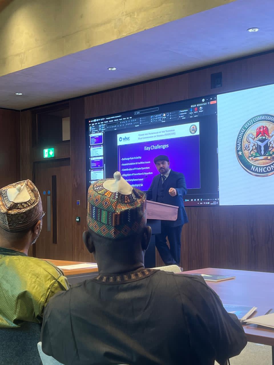 Mohsin Tutla presenting a WHUC slide titled Key Challenges, with the NAHCON seal on screen